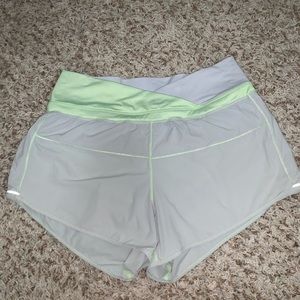 Grey and yellow/green cross waist Lululemon shorts